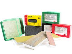 Hand blocks and abrasive sponges